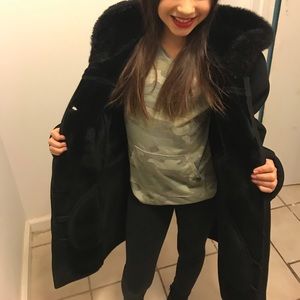 Black faux fur coat
